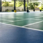 Berapa lama umur cat lapangan outdoor pada lapangan badminton indoor?
