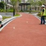 Checklist kemiringan dan drainase untuk coating jogging track di jalur lari kompleks